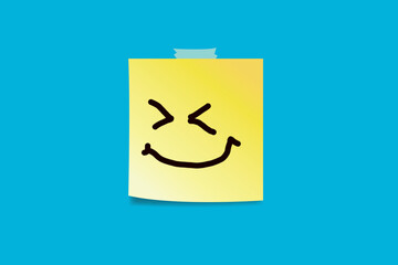 Happy faces drawn on sticky notes.