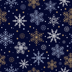 Christmas, New Year, Winter seamless pattern with blue, golden and white snowflakes on the dark blue background.