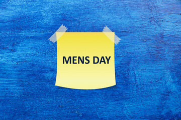 Sticky note with Mens Day