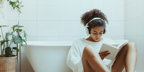 Enjoying Relaxation and Engaging in Reading within a Stylish and Comfortable Bathroom Setting
