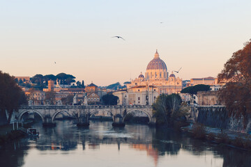Obraz premium View of St. Peter's Basilica in Vatican, Tiber River and Aelian Bridge in early morning skyline at sunrise, idyll, Rome, Italy.