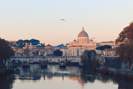 View of St. Peter's Basilica in Vatican, Tiber River and Aelian Bridge in early morning skyline at sunrise, idyll, Rome, Italy.