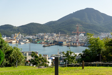 Tongyeong City, South Korea, October 10, 2025: Open Field View from Seoporu Wooden Pavilion where...