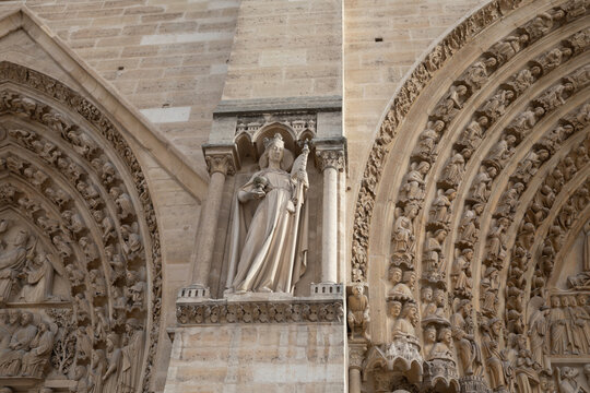 Gothic Sculpture Detail and Archivolts on the Facade of Notre Dame Cathedral, Paris