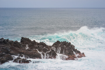 Powerful Ocean Waves Crashing on Rocky Coast