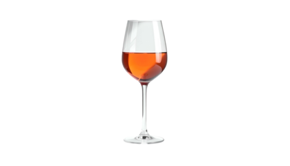 A stemmed glass filled with rose-colored liquid against a black background