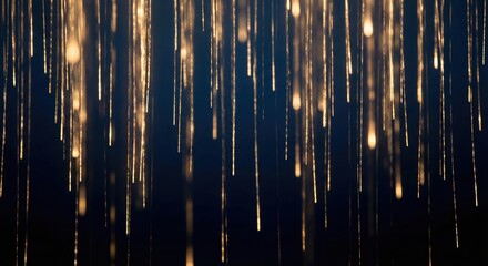 Abstract golden particles falling like rain against a dark background, a shimmering light effect