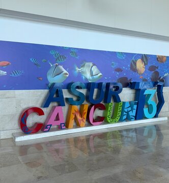 Cancun, Mexico, November 20, 2025 - ASUR Terminal 3 sign in Cancun International Airport