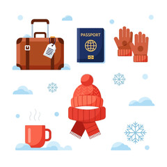Winter Travel Essentials with luggage passport gloves hat and hot beverage in snowy scene