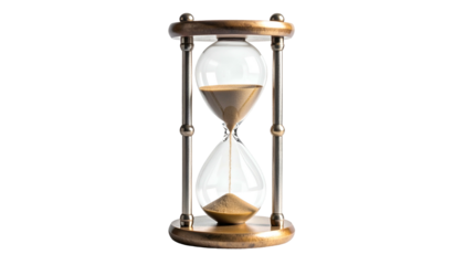 An antique brass hourglass with sand flowing through a narrow neck on black background