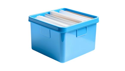 A bright blue plastic storage box filled with paper, against a dark background