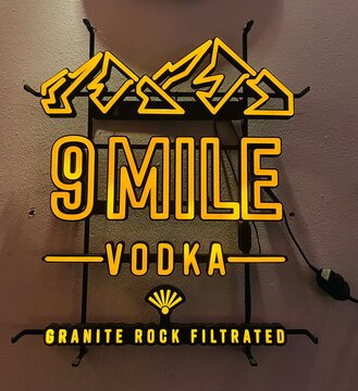 Germany, Paderborn, December 21. 2025, neon LED sign of 9 Mile Vodka, a brand of MBG Group (MBG INTERNATIONAL PREMIUM BRANDS GmbH) based in Paderborn