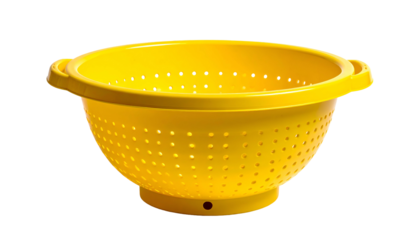 A vibrant yellow colander, bowl-shaped with handles and many holes, isolated on black