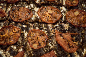 Oven-baked sardines with tomatoes
