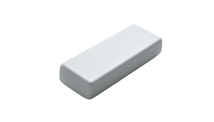 A white rectangular object with rounded edges, elevated on a stark black background