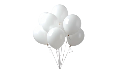 A bunch of white, inflated balloons, tied together with ribbons, isolated on black