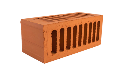 Close-up of a hollow, orange-red brick, set against a black backdrop