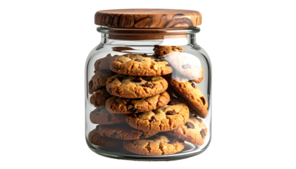 Glass jar filled with chocolate chip cookies, wooden lid, against a dark background
