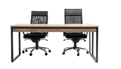Office setup with two black chairs facing each other at a wooden desk, black background