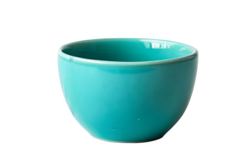 Close-up shot of a single glossy turquoise ceramic bowl isolated on black isolated on transparent background