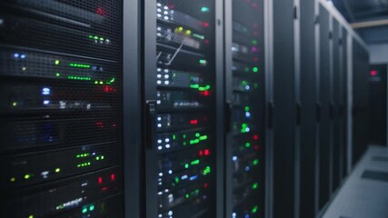 Close-up shot of server racks with blinking lights, cables, and hardware, symbolizing data centers, network infrastructure, technology, and high-performance computing. - Powered by Adobe