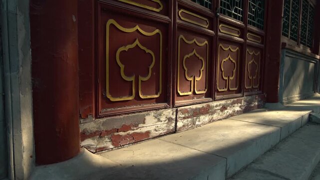 Footage of traditional Chinese architecture with willow catkins floating gently in the air, creating a poetic spring atmosphere and a sense of calm and nostalgia.