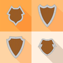 Set of cartoon metal shields with shadows