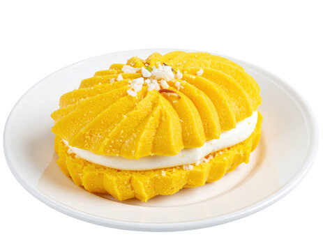 Cham cham cream-filled sweet with Cream Filling and Coconut Flake Garnish
