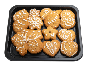 Assortment of Decorated Gingerbread Cookies in a Black Tray, Festive Treats.