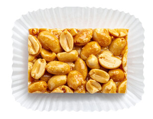 Fototapeta premium Rectangular Peanut Brittle Slab with Golden Caramel Coating in Paper Liner 