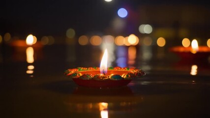 Diwali celebration with oil lamps and bokeh lights representing the festive spirit of this Hindu festival of lights