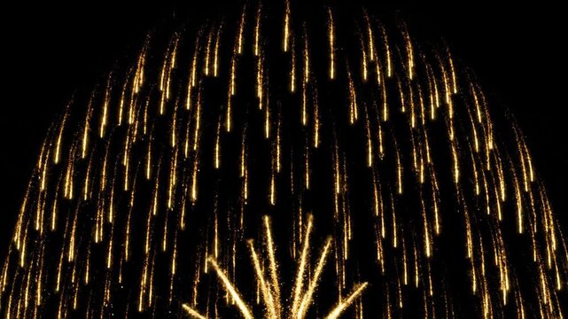 Golden Celebration: A mesmerizing sequence of vibrant gold fireworks exploding against a stark