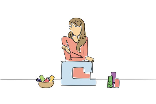 Single line drawing of a woman standing confidently beside a sewing machine, surrounded by spools of thread and fabric, symbolizing joy and creativity of sewing as a hobby. National Sewing Machine Day