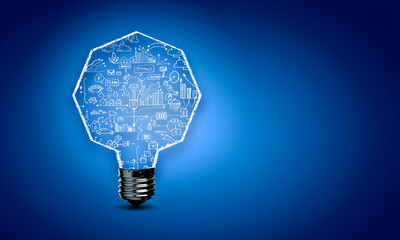 Creative Business Idea Concept with Light Bulb Shape Filled with Strategic Doodles on Blue Background