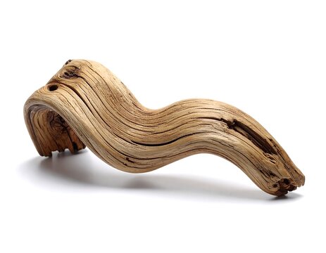 Close-up of weathered, curvy driftwood on a plain white background