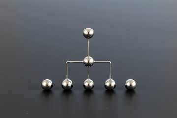 Obraz premium Futuristic Metallic Molecular Model Dark Background
