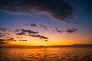 Aerial of Cloud with sunset sky background in Thailand,Cloudscape time lapse background Dark red purple sunset sky Nature background, sunset in the clouds
