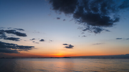 Aerial of Cloud with sunset sky background in Thailand,Cloudscape time lapse background Dark red purple sunset sky Nature background, sunset in the clouds