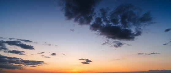 Aerial of Cloud with sunset sky background in Thailand,Cloudscape time lapse background Dark red purple sunset sky Nature background, sunset in the clouds