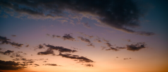 Aerial of Cloud with sunset sky background in Thailand,Cloudscape time lapse background Dark red purple sunset sky Nature background, sunset in the clouds