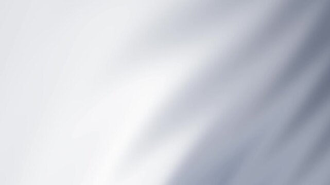 Blurry silver gradient light background and shadow on a white surface. Great for abstract backgrounds, minimalistic designs, presentations, artistic concepts, and digital art projects.