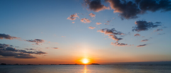 Aerial of Cloud with sunset sky background in Thailand,Cloudscape time lapse background Dark red purple sunset sky Nature background, sunset in the clouds