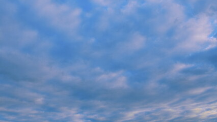 Fototapeta premium The Beautiful Cloudy Sky Overhead with Soft and Gentle Lighting Creates a Serene Atmosphere