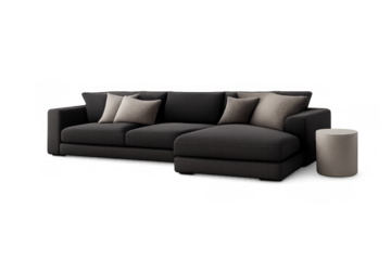 Black fabric sectional sofa with chaise lounge and decorative pillows, accompanied by a side table, ideal for interior design concept