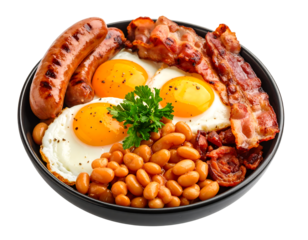 Hearty breakfast bowl with fried eggs, sausages, crispy bacon, and baked beans.
