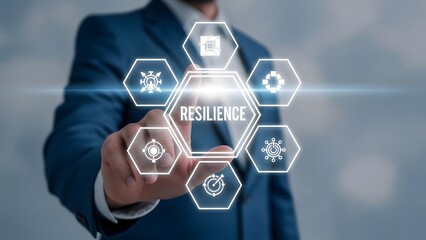 Businessman interacting with a futuristic digital interface displaying resilience concept