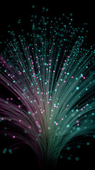 Vertical fountain burst of teal and magenta fiber optic strands on black background