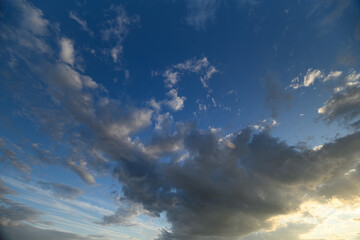 Obraz premium A Stunningly Beautiful Sky with Clouds at Beautiful Sunset, Radiating Vibrant Colors