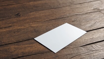 Blank White Card on Rustic Wooden Table Setup for Creative Photography and Design Purposes
