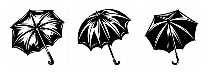 Three open umbrellas in a row classic black and white design for weather protection and style